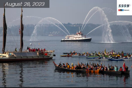 Suquamish, Muckleshoot and Hawaiian canoes surround Polynesian canoe Hokule'a during a water welcome ceremony on Elliot Bay.