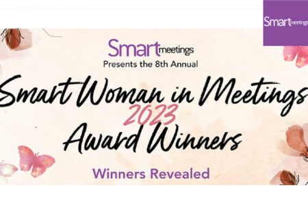 A pale orange banner with pink butterflies announcing Smart Woman in Meetings winners