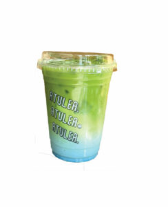 A blue and green beverage in a plastic cup.